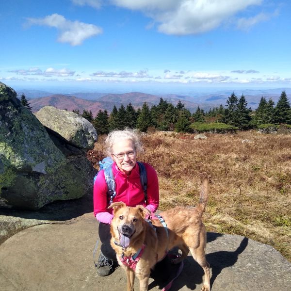 Kerry Linehan hiking with her dog
