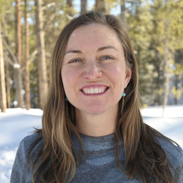 Erin Allaman outdoors with trees in background